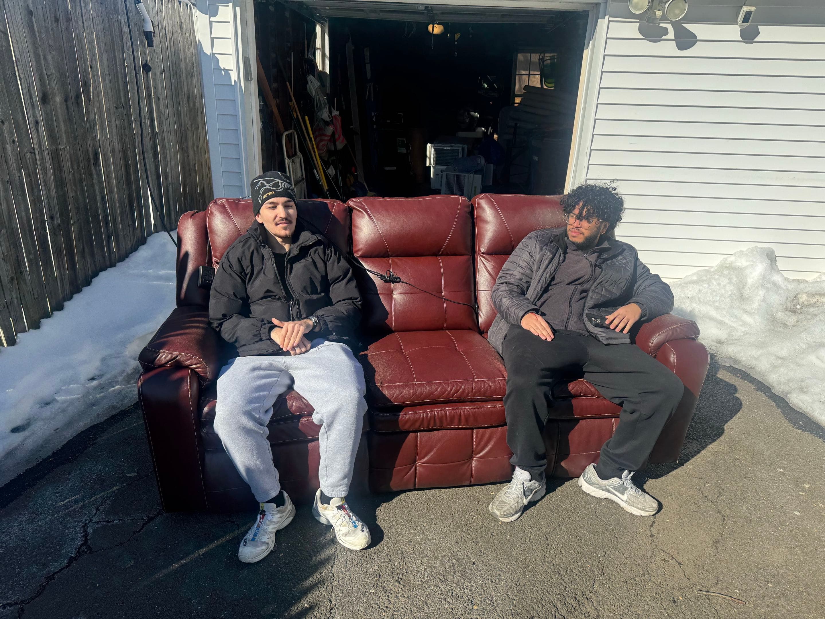 Haul Lotta Junk crew with couch ready for removal